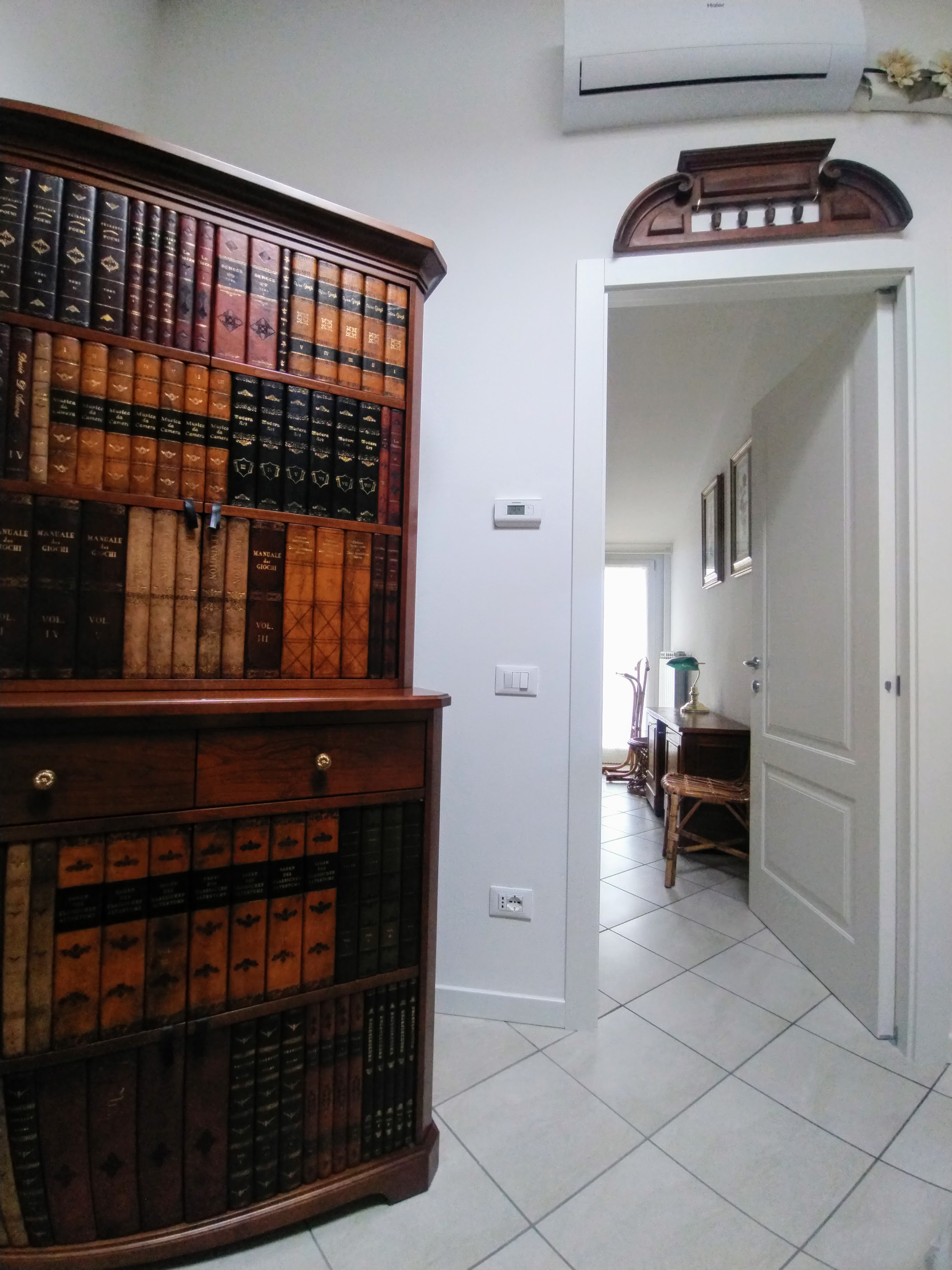 Reading nook under the sloped attic ceiling at Mansarda di Masha